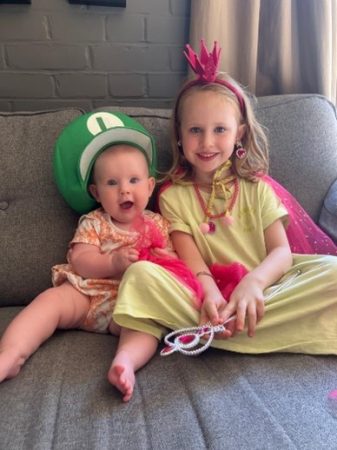 Penelope and Grace dressed as Luigi and Peach